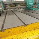 []出售2014年春雨龙门刨铣床，一个铣头，5.5千瓦，两个.